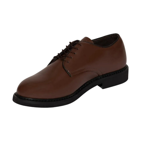 Sideview of Brown leather dress shoe on a white background.  Rothco. Colin Carr Agencies, authorised Rothco dealers New Zealand, Fiji, Tonga, Samoa, Vanuatu, Australia, Cook Islands. Police, Milititary, Defence.