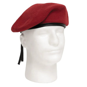 Red beret on a mannequin head against a white background. Rothco. Colin Carr Agencies.