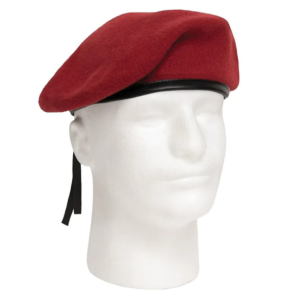 Red beret on a mannequin head against a white background. Rothco. Colin Carr Agencies.