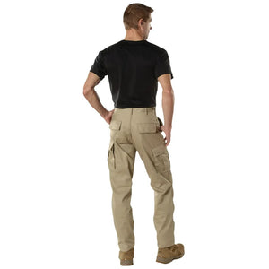 Man wearing beige cargo pants on a white background. Black leather oxford dress shoe on a white background.  Rothco. Colin Carr Agencies, authorised Rothco dealers New Zealand, Fiji, Tonga, Samoa, Vanuatu, Australia, Cook Islands. Police, Milititary, Defence.
Rear view with pockets.
