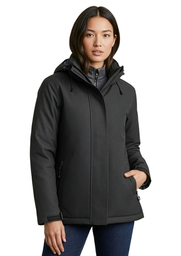 Woman wearing a black jacket on a white background. Colin Carr Agencies uniform specialist. Colin Carr Agencies – Spécialiste des uniformes professionnels