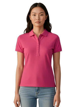 Woman wearing a pink polo shirt and blue jeans on a white background