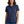 Woman wearing a navy blue polo shirt on a white background