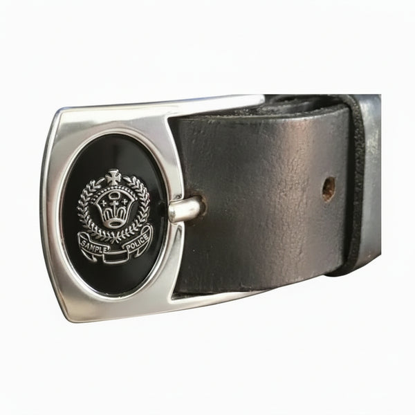 Belt with a metallic buckle featuring an emblem on a white background