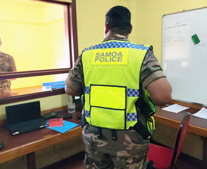 Samoan Police wearing customised uniform supplied by Colin Carr Agencies, offering custom uniforms, defence and police insignia for the Pacific