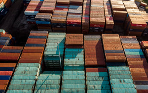 Shipping containers, New Zealand export supplier Colin Carr are procurement experts in custom uniform, PPE, food processing and specialist equipment sourcing