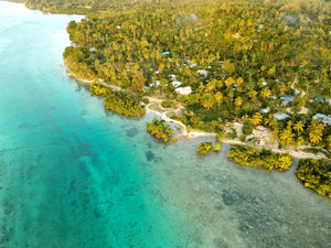 Aerial view of a Pacific island, Colin Carr Agencies specialise in South Pacific freight and delivery